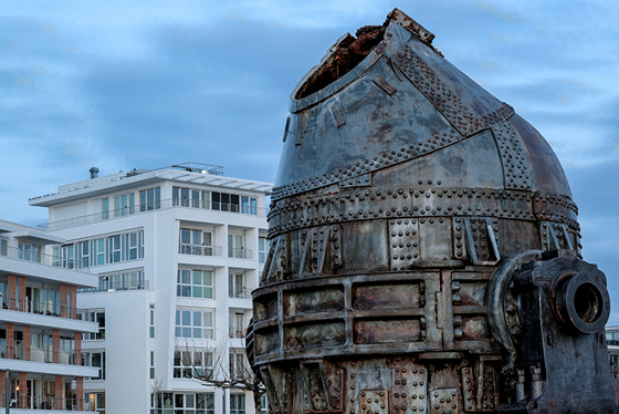 The area of former steel factory "Phoenix Ost" was turned into an artificial lake surrounded by office and apartment buildings. A former converter (a device to make steel from iron), shown in the picture in front of the new buildings, was placed on the lake shore as a monument.