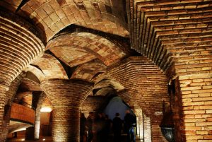 Image: Photograph of supportive brick arches in the basement of the Palau Güell by V C via Flickr, CC BY-NC 2.0 license.