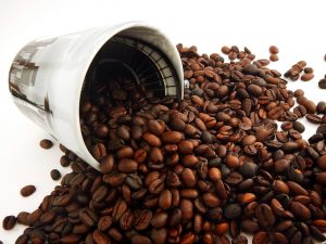 Coffee held in a grinder that has tipped over and spilled out